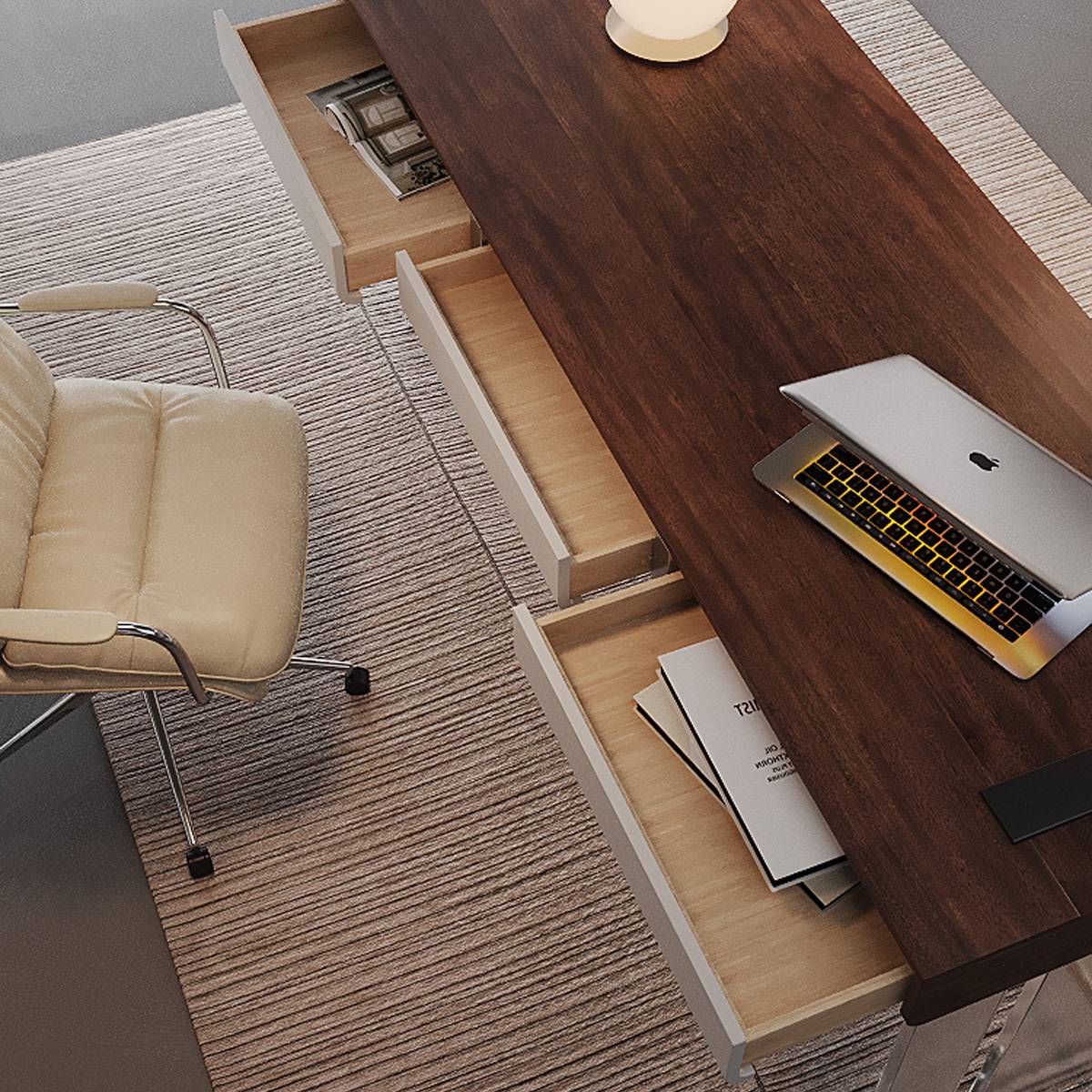 Top-down view showing the open drawers and laptop on the desk
