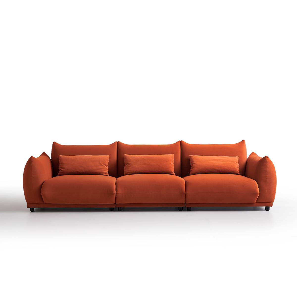 Front view of the orange 4-seater sofa highlighting the symmetrical design
