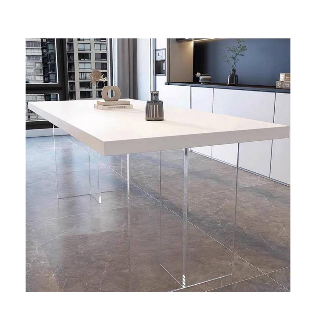 White sintered stone dining table with acrylic legs in a modern dining room