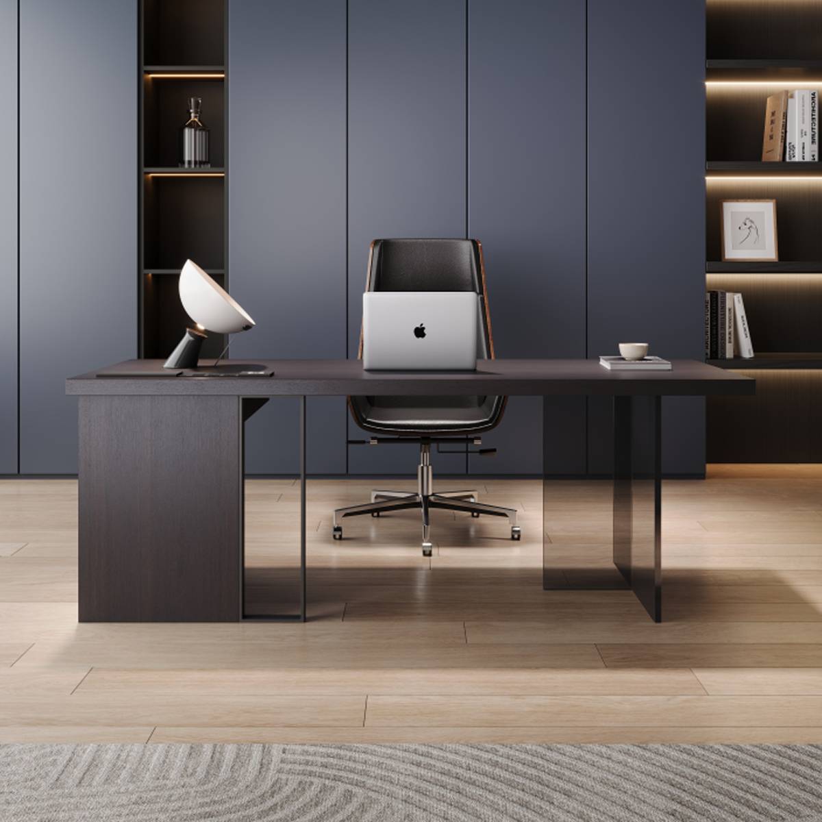Front view of the desk with a laptop and office chair