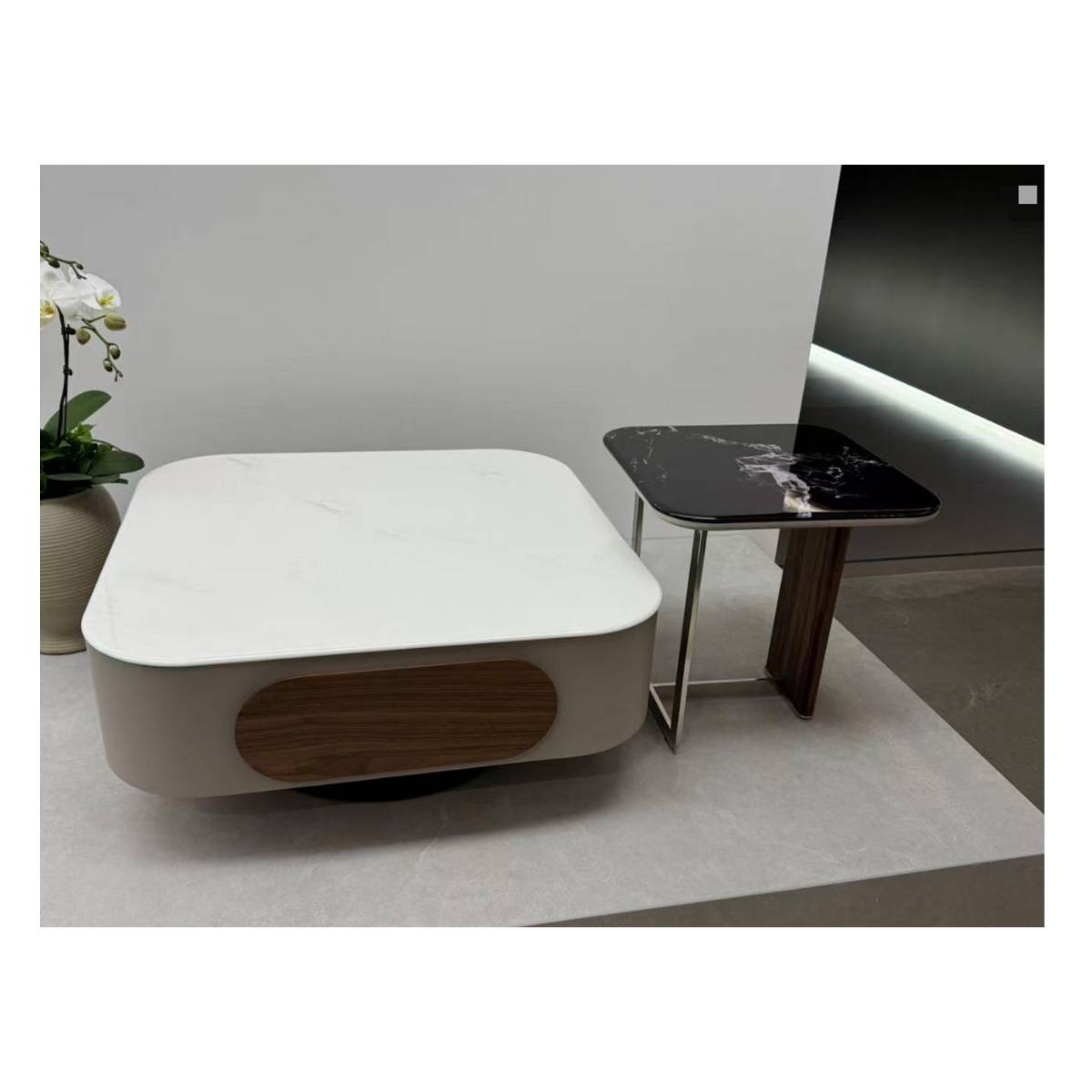 Lifestyle shot of the coffee table set in a modern interior with orchid plant
