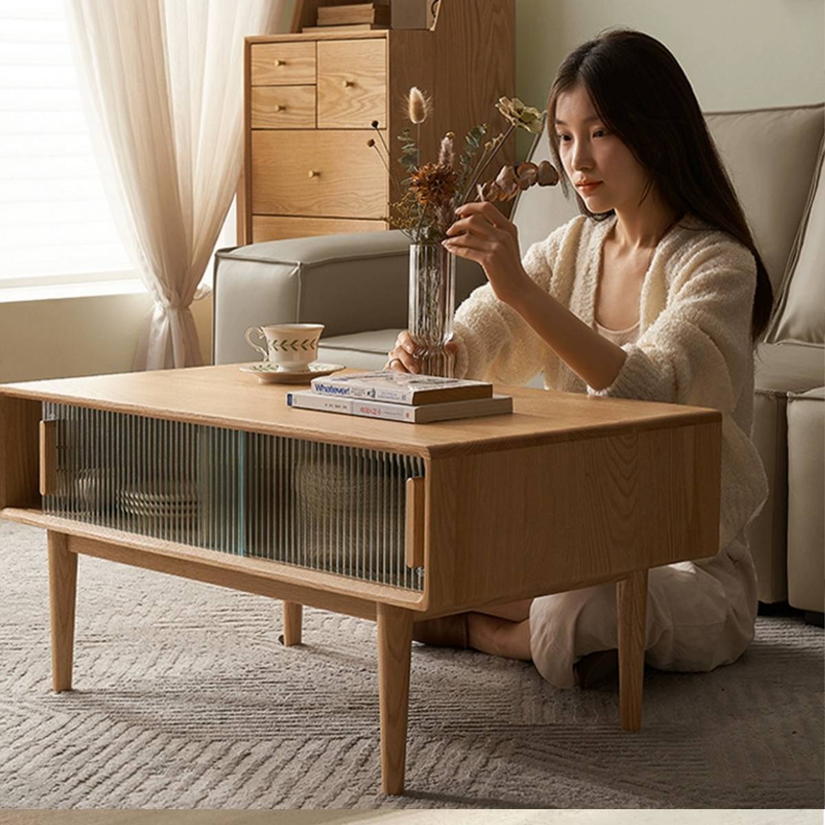 Side angle view of the Fuji coffee table showing the sliding door mechanism