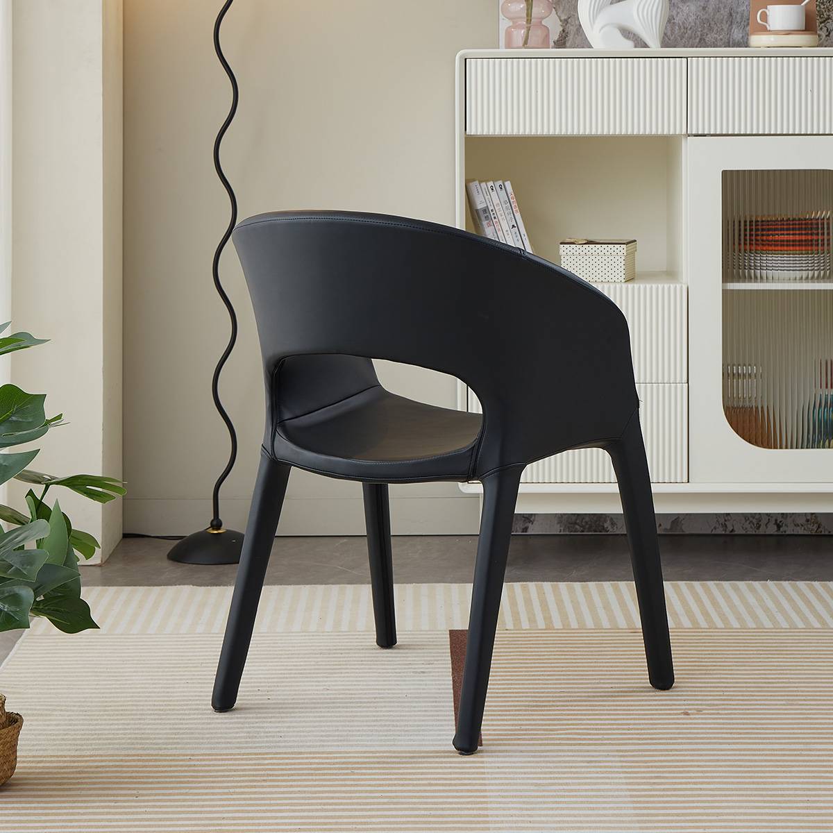 Side view of black modern lounge chair