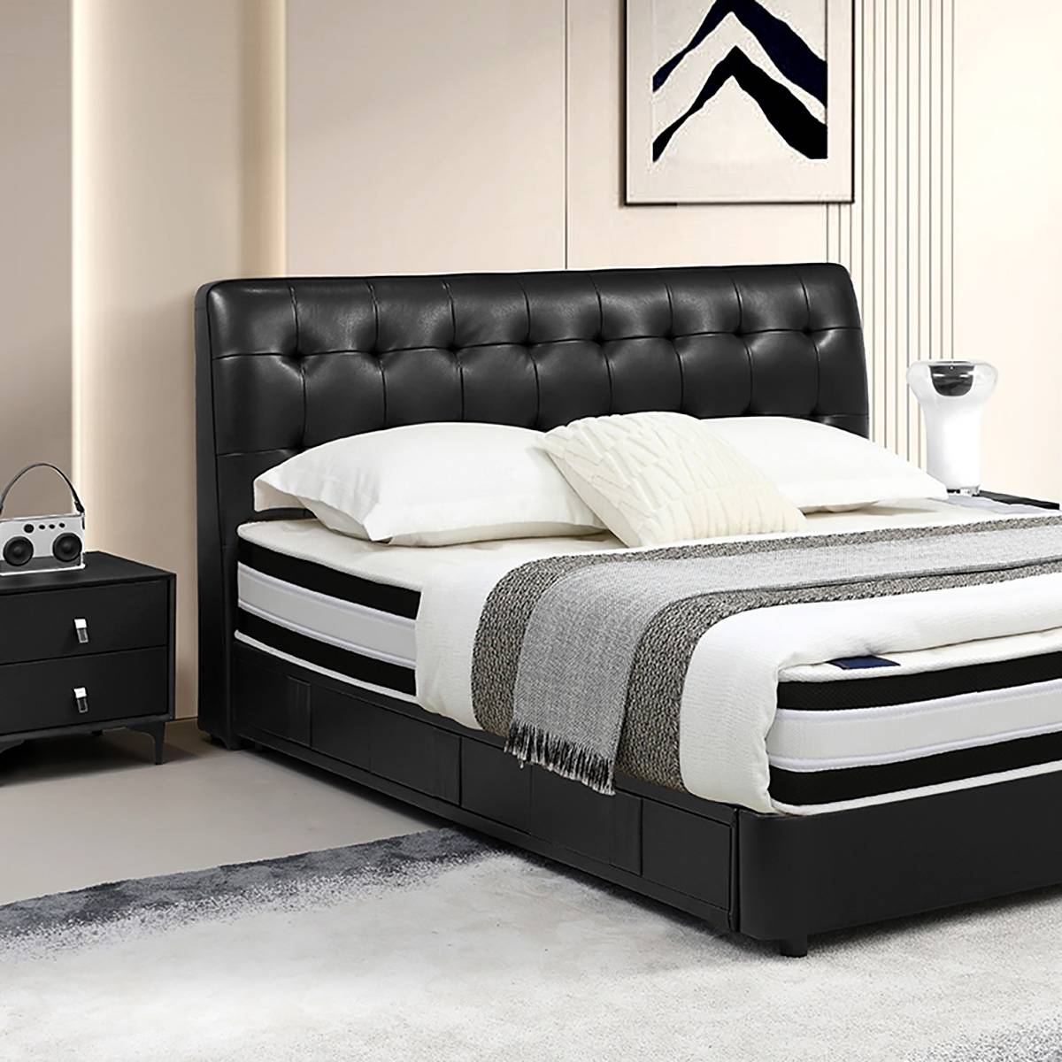 Close-up view of the bed headboard and bedding