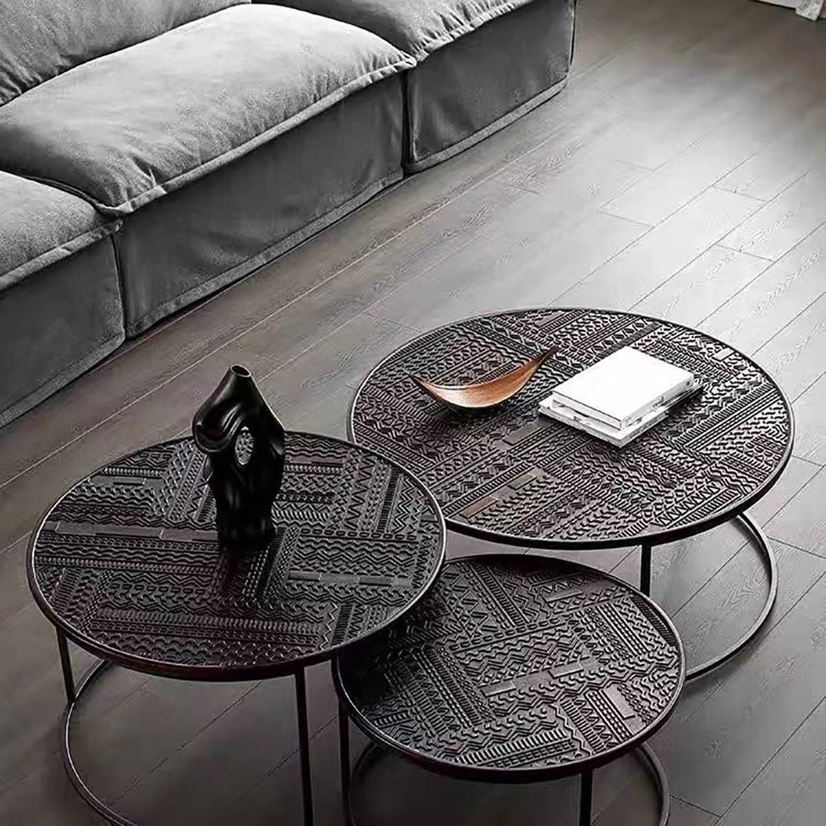 High angle view of the nesting coffee tables on a wooden floor
