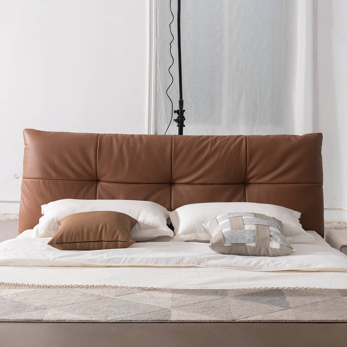 Close-up of the bed headboard and pillows