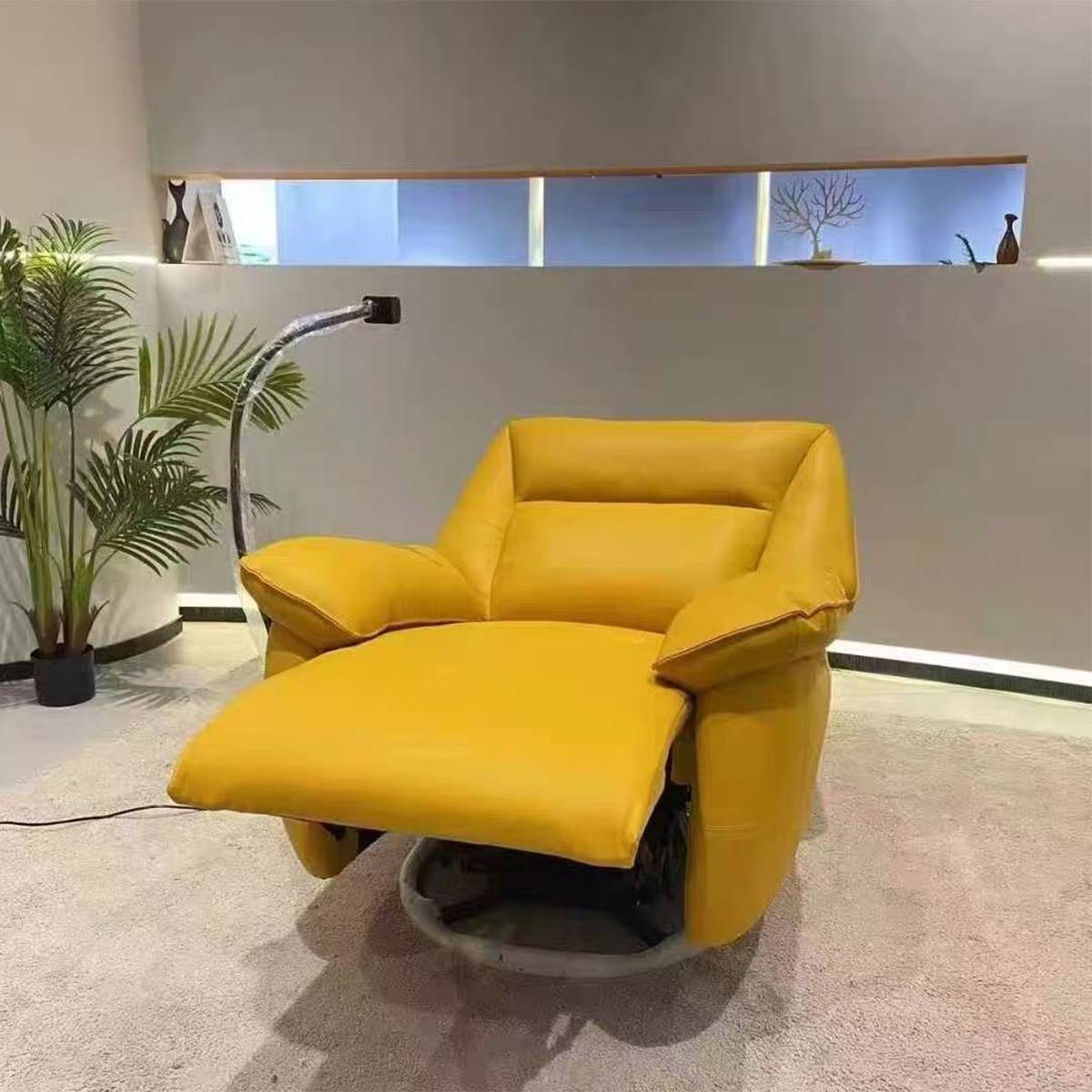 Yellow genuine leather electric recliner chair in reclined position