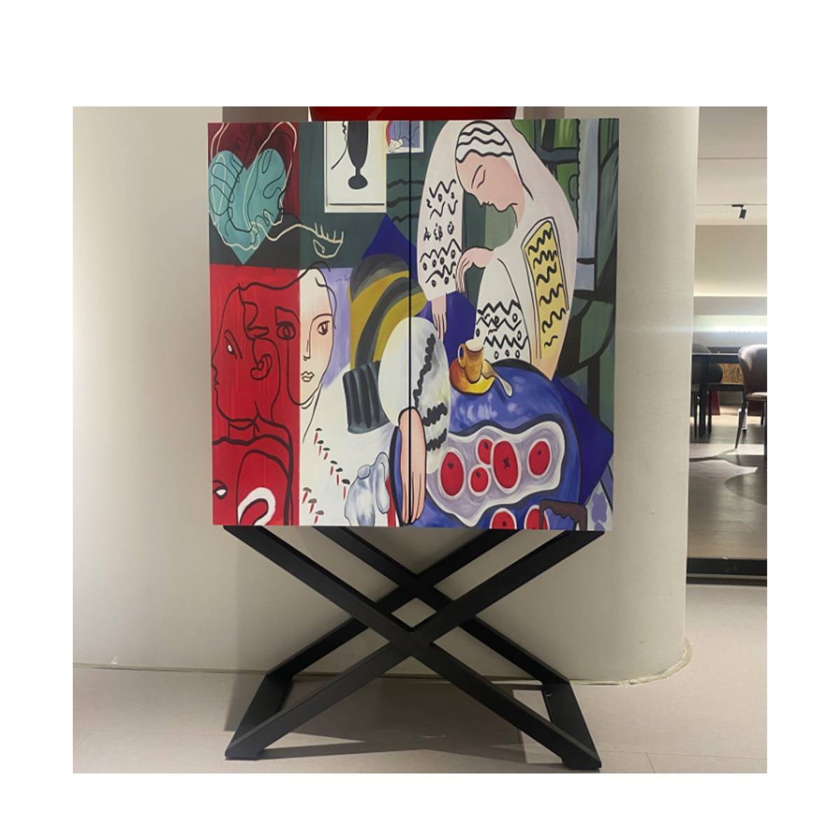 Sideboard displayed in a showroom setting showing the art print detail