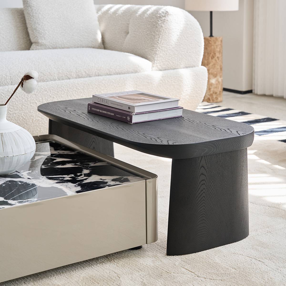Close-up of the dark wood side table and marble coffee table