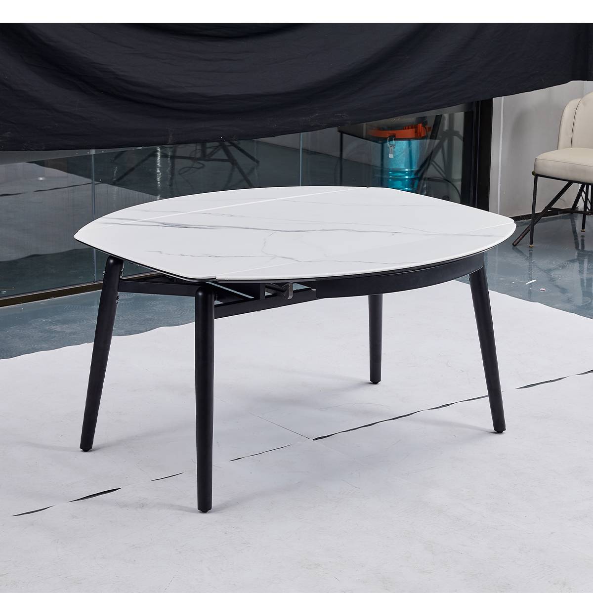 Dining table configured as a round table