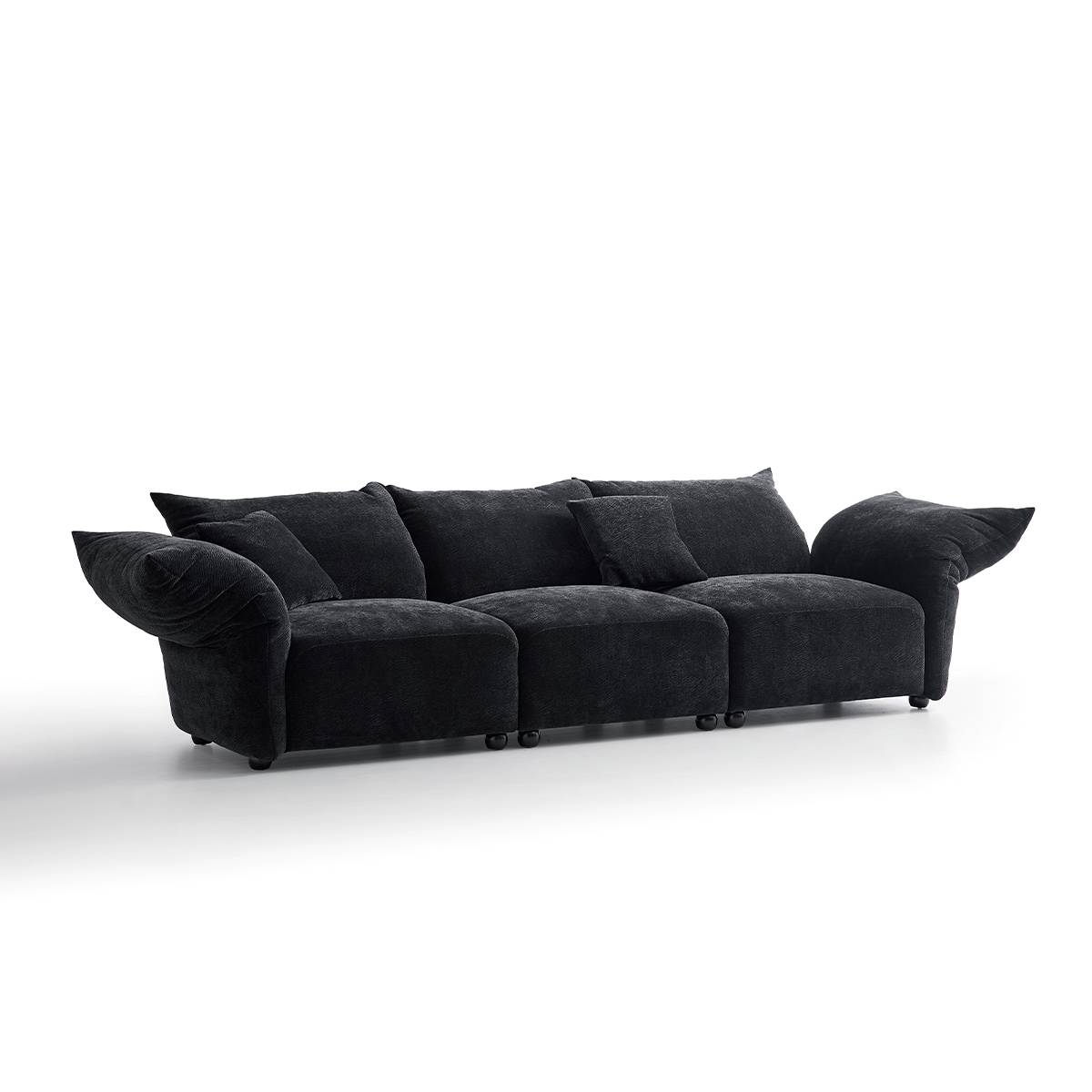 Side view of black petal-shaped modular sofa