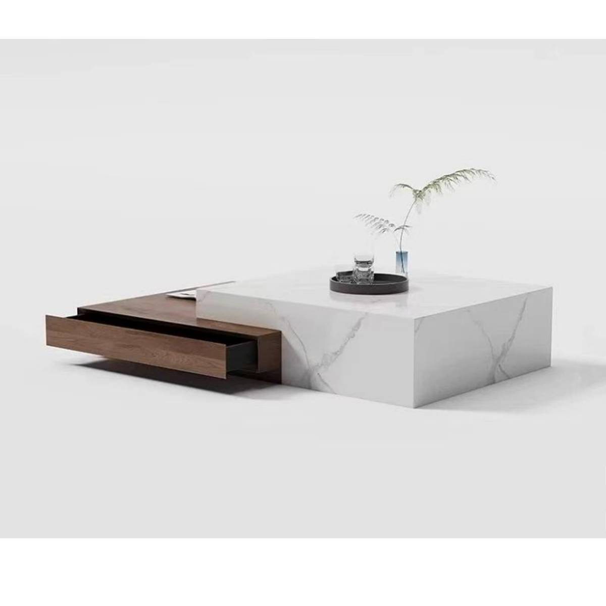Side view of the coffee table showing the open drawer and sintered stone texture.
