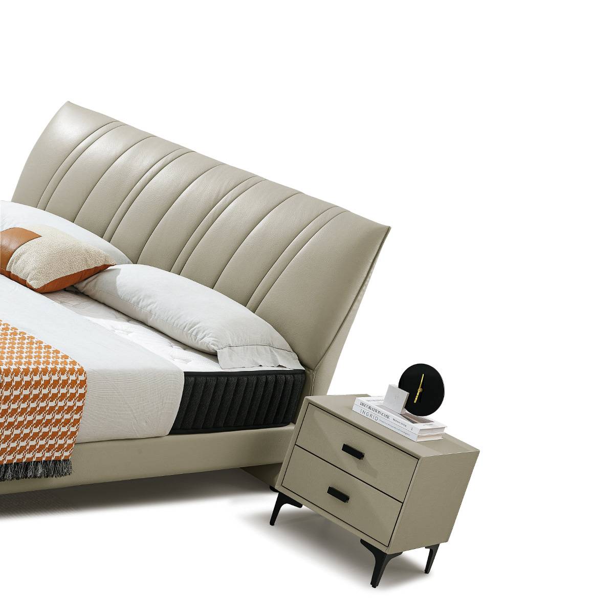 Front view of the beige tufted leather bed with matching nightstands