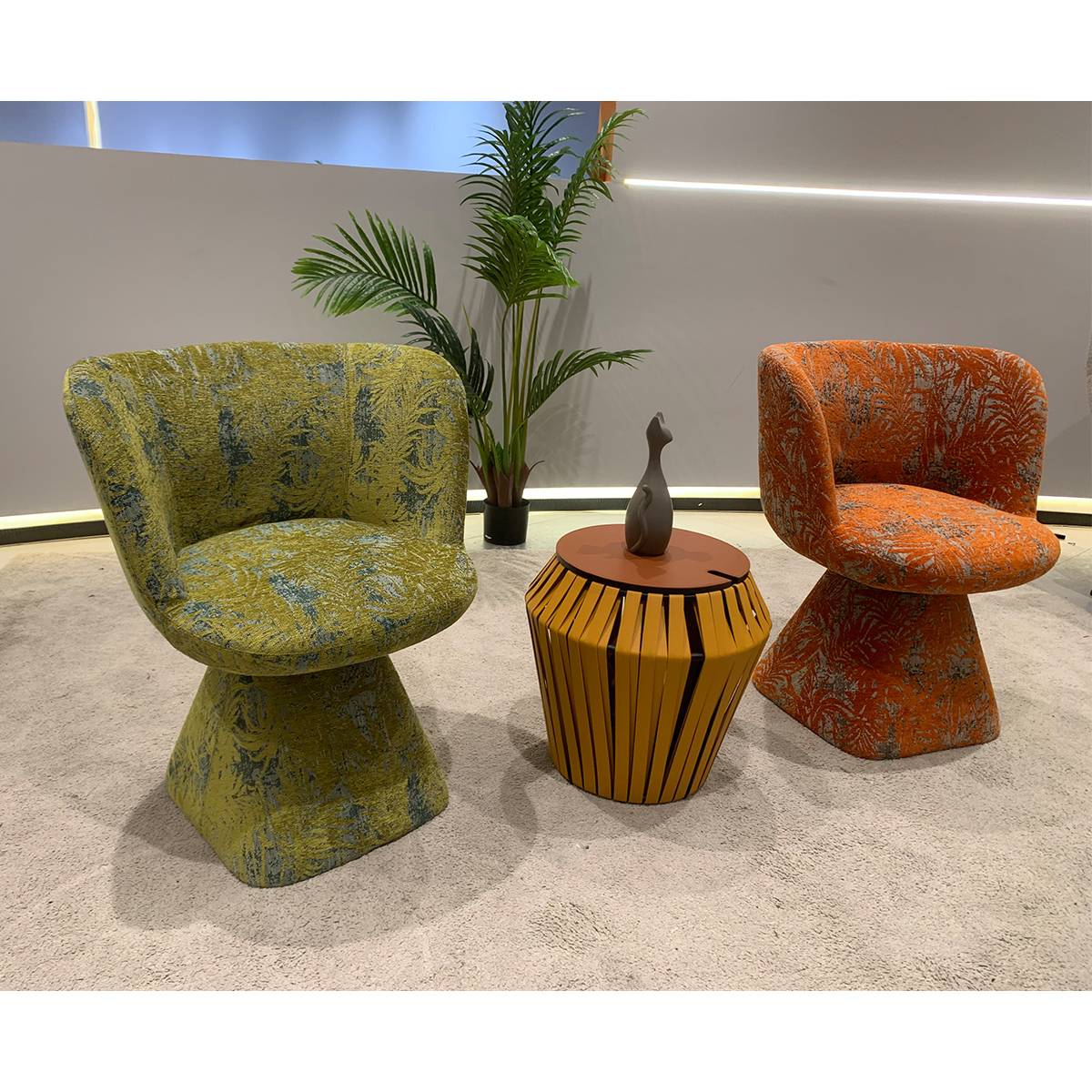 Front view of green and orange lounge chairs