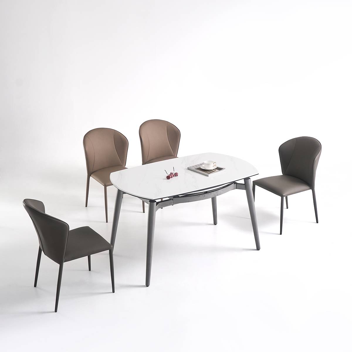 Dining table set with four chairs showing the table shape and leg structure