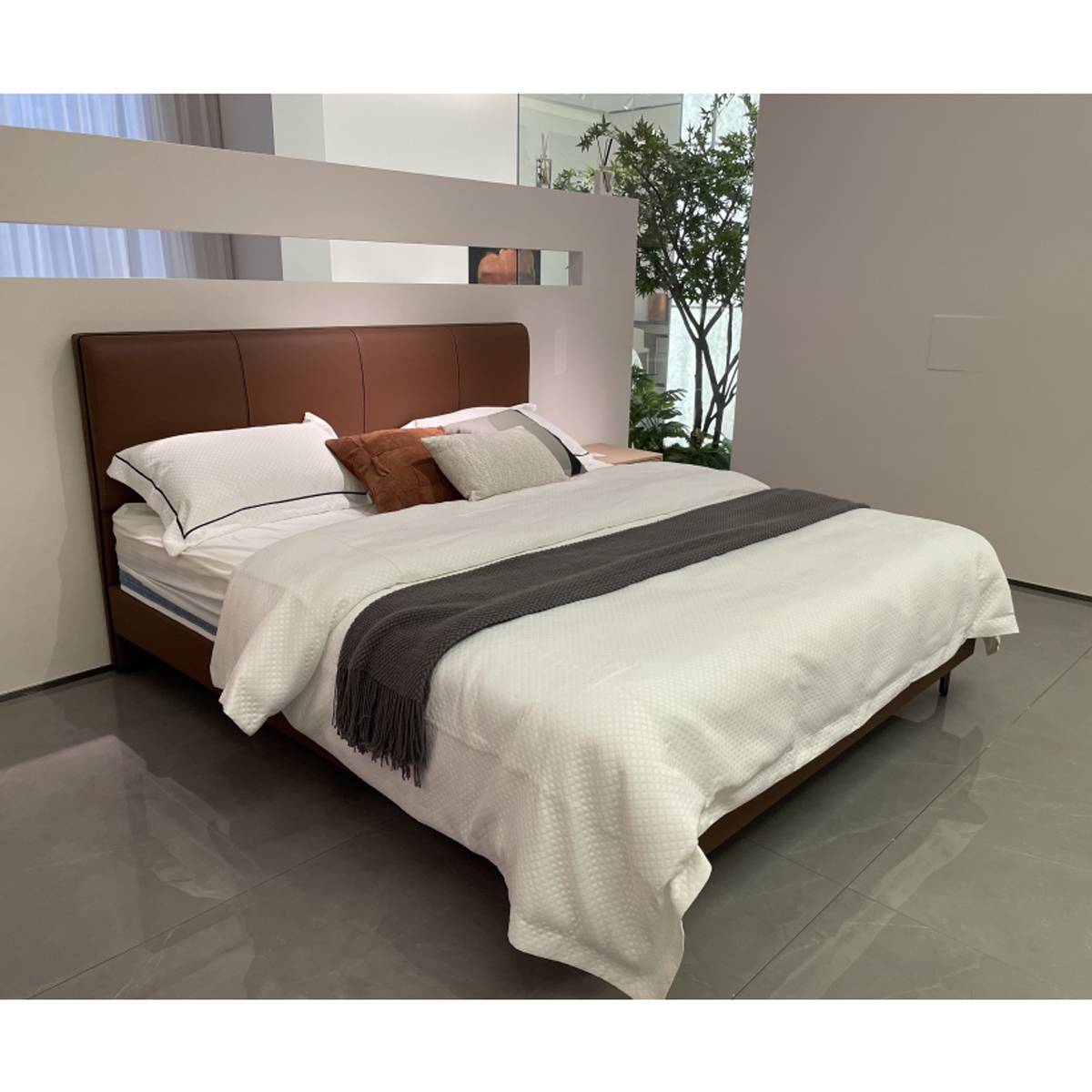 Side angle view of the bed in a showroom setting