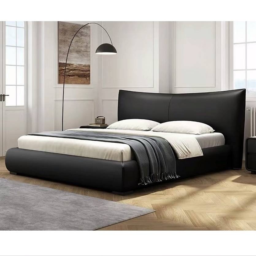 Green leather soft bed with curved headboard and base