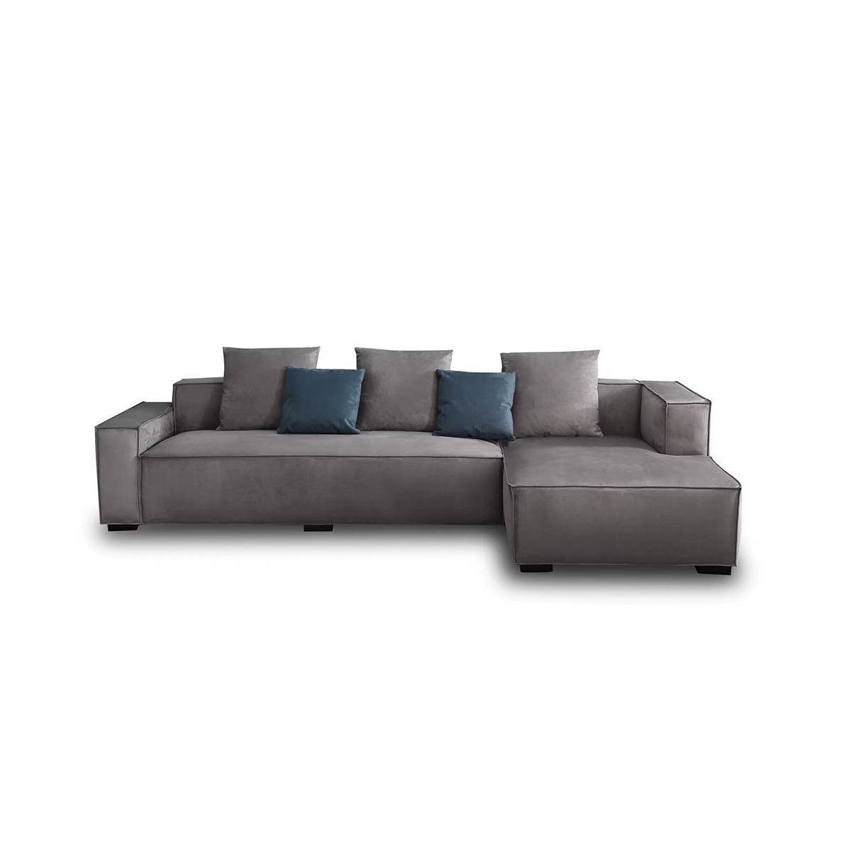 Front view of grey fabric modular sofa with chaise