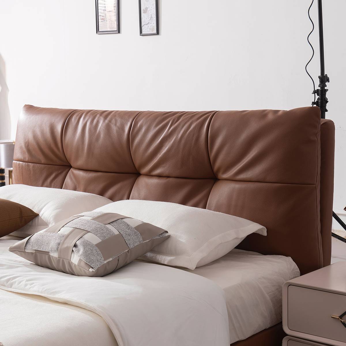 Side angle view of the bed headboard and pillows