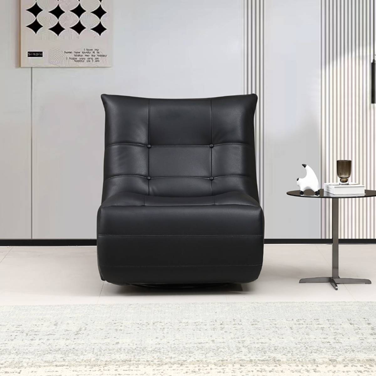 Front view of the black leather lounge chair in an upright position