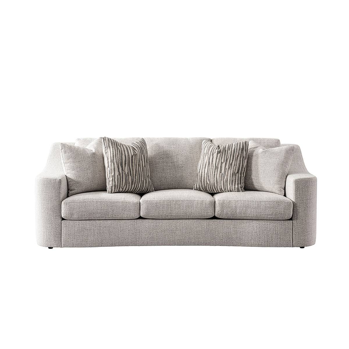 Front view of the light grey fabric sofa with striped pillows
