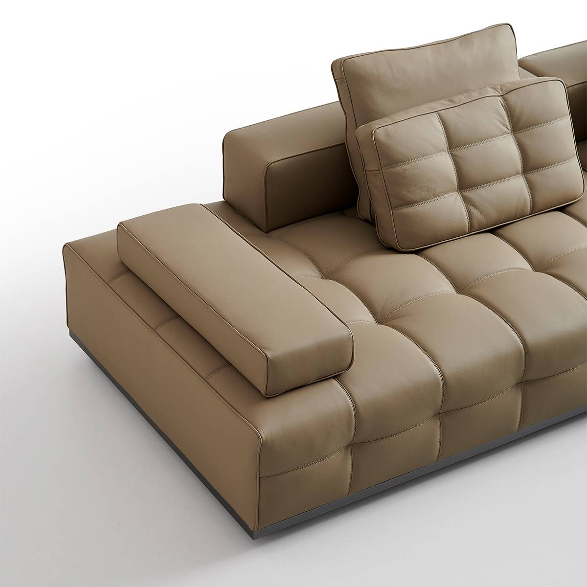 Detail shot of the Lawrence sofa armrest and corner section