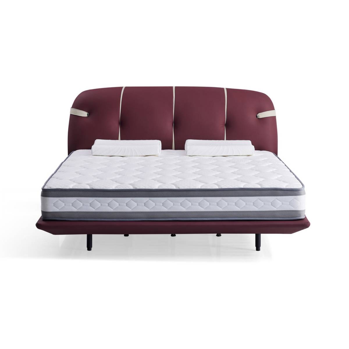 Front view of a burgundy leather floating bed with a white mattress and two pillows