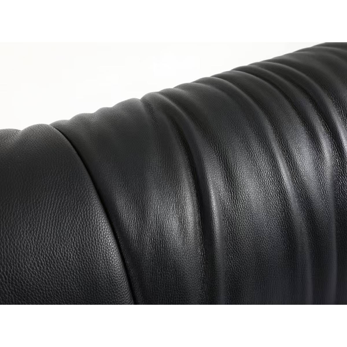 Detail of the tan woven leather panel on the side of the headboard