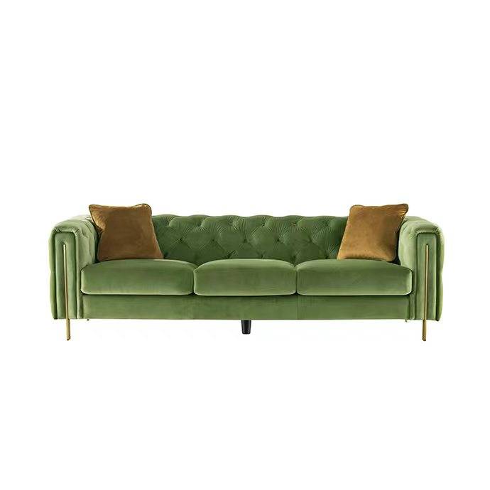 Green fabric sofa angled view