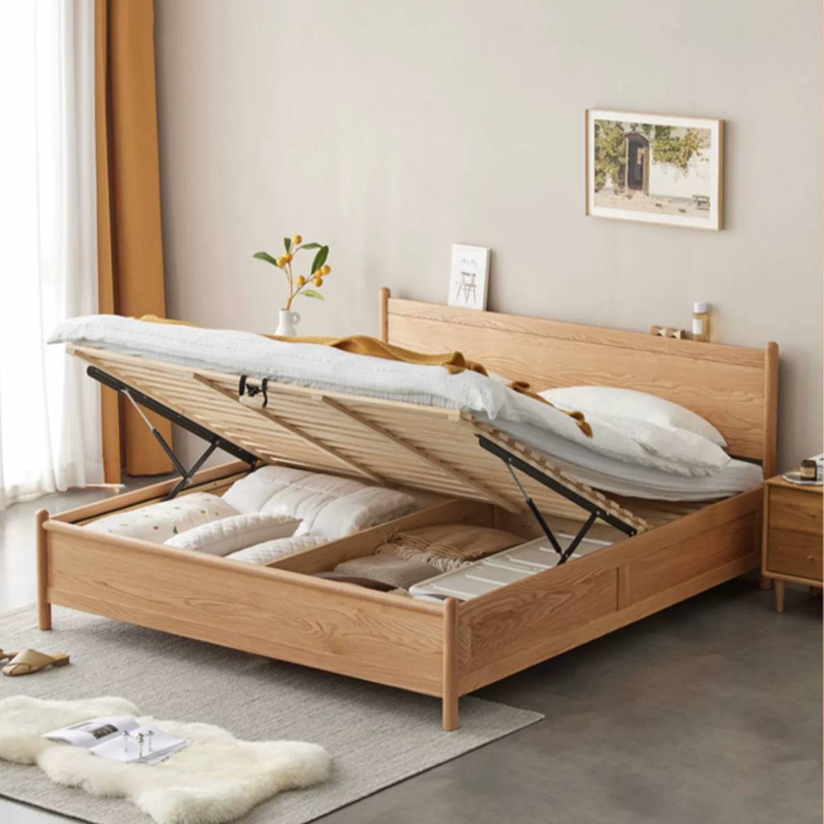 Light wood storage bed with gas lift mechanism raised to show under-bed storage