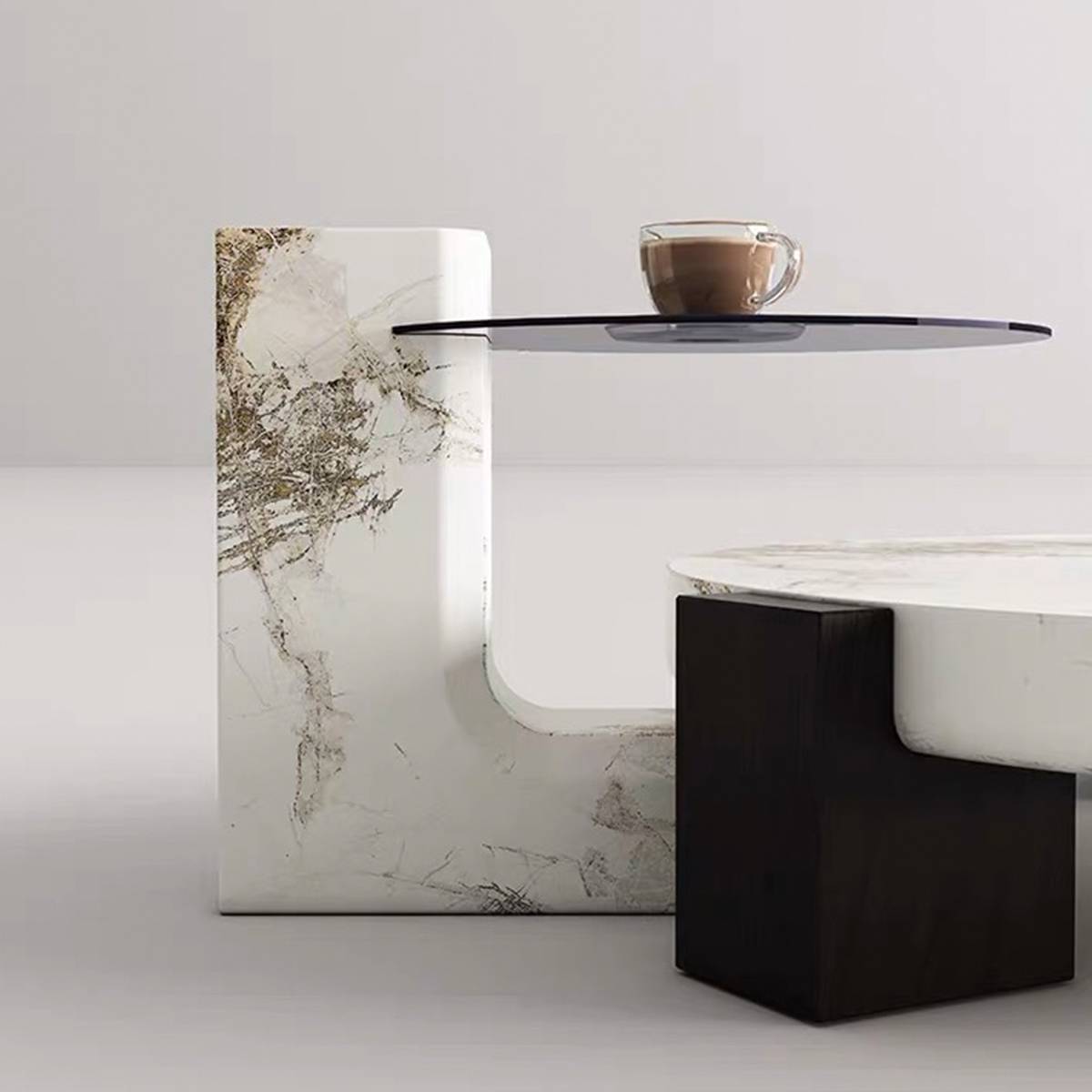 Close-up of the side table showing the marble texture and glass shelf with a coffee cup
