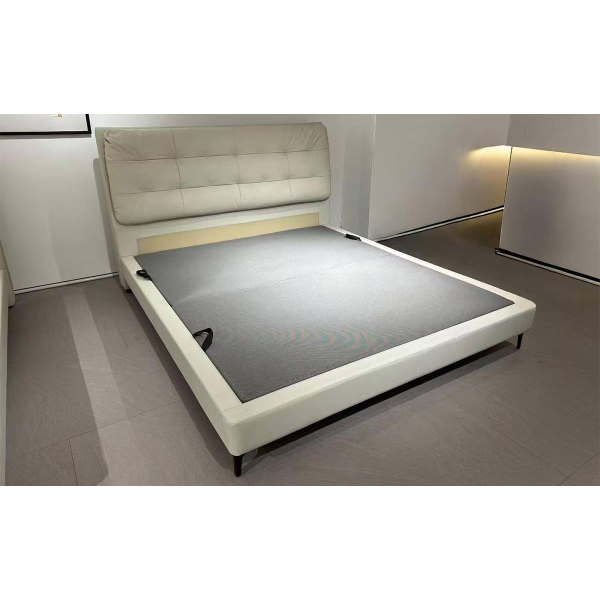 View of the bed frame without mattress showing the base structure