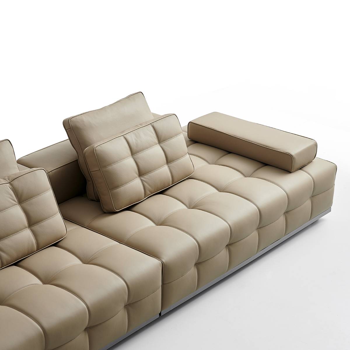 Close-up detail of the Lawrence sofa cushions and leather texture