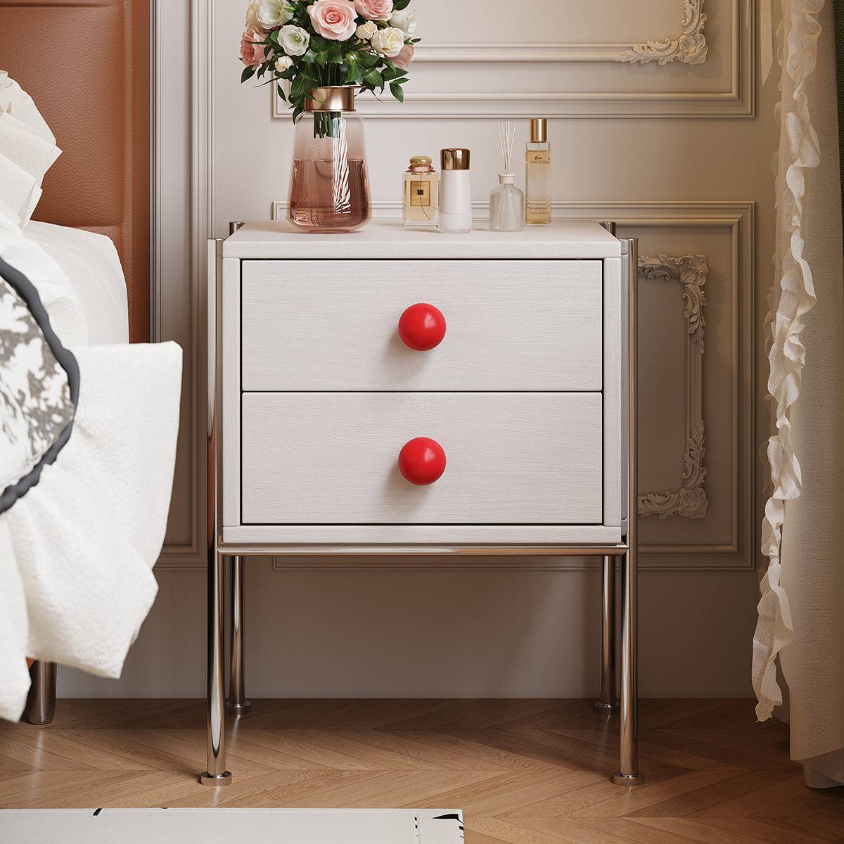 White Bauhaus bedside table with red spherical knobs and stainless steel legs