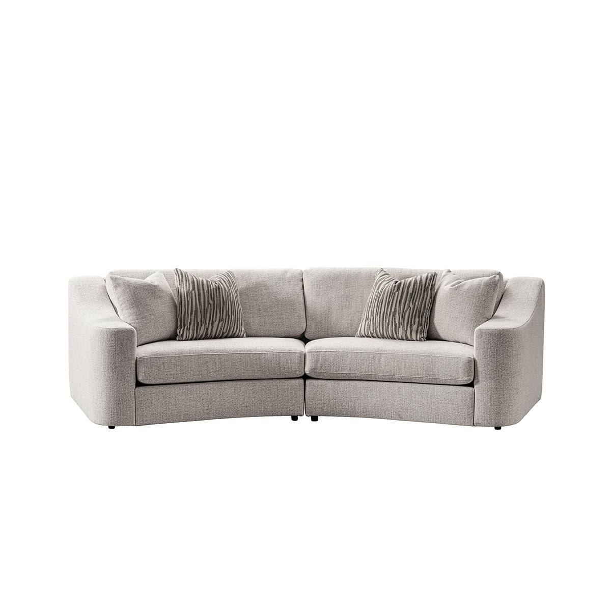 Side view of the curved sofa showing the armrest detail