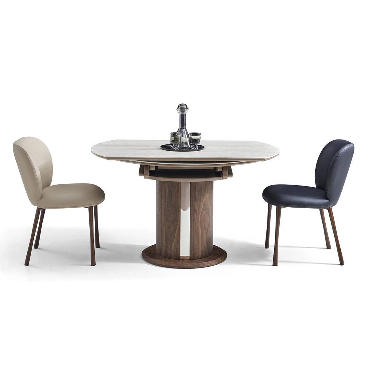 Side view of the table in extended rectangular shape with two chairs