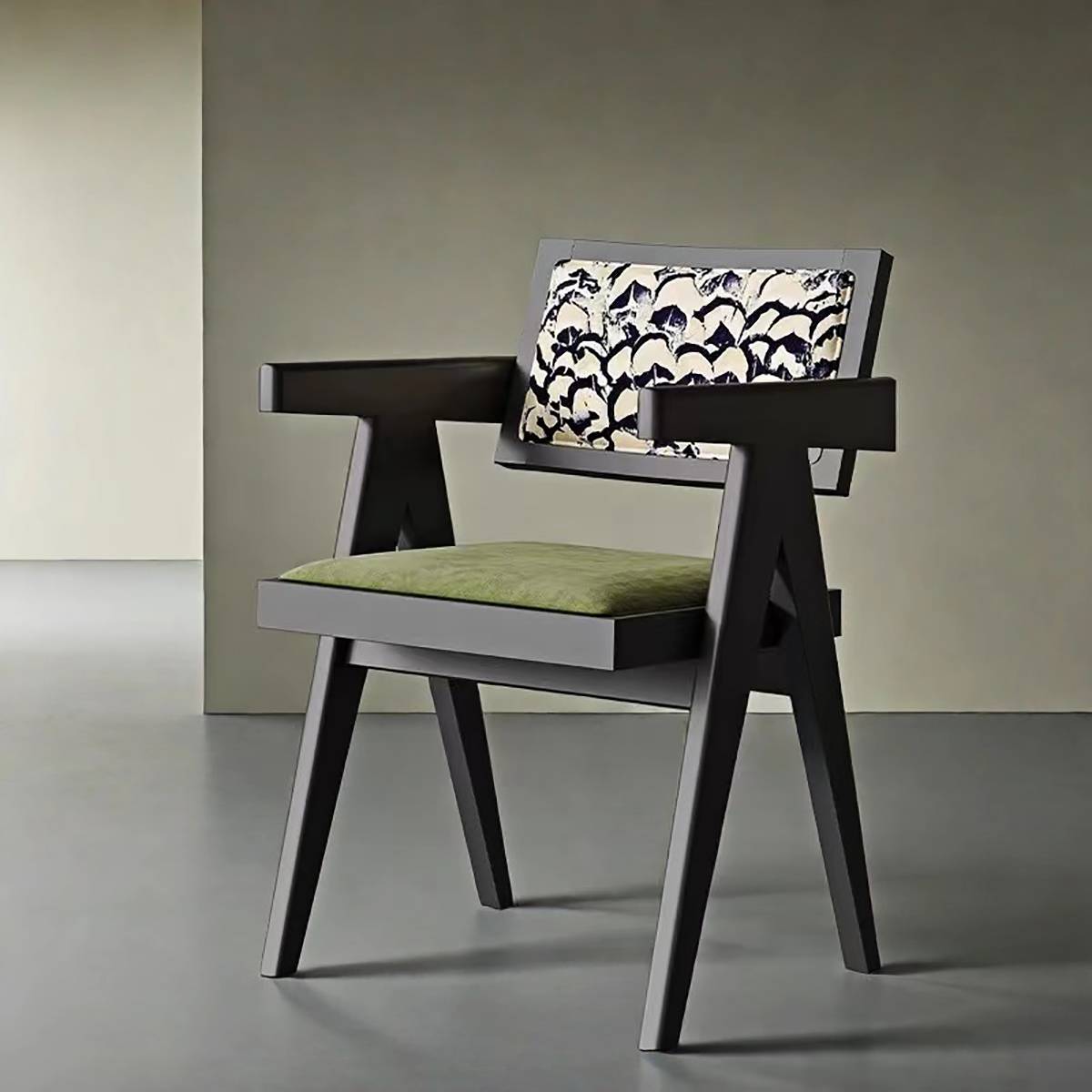 Close-up of the dining chair showing the armrest and patterned backrest detail