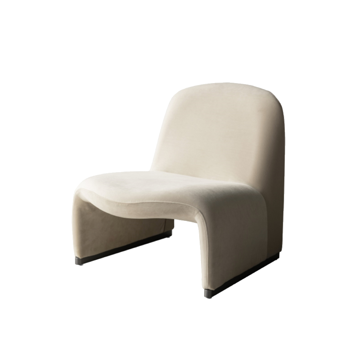 Side view of the same lounge chair model in a cream color