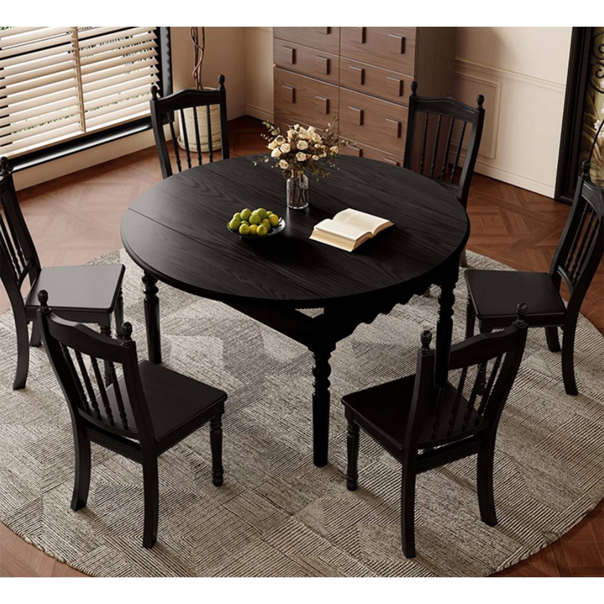 Black finish round dining table with spindle back chairs