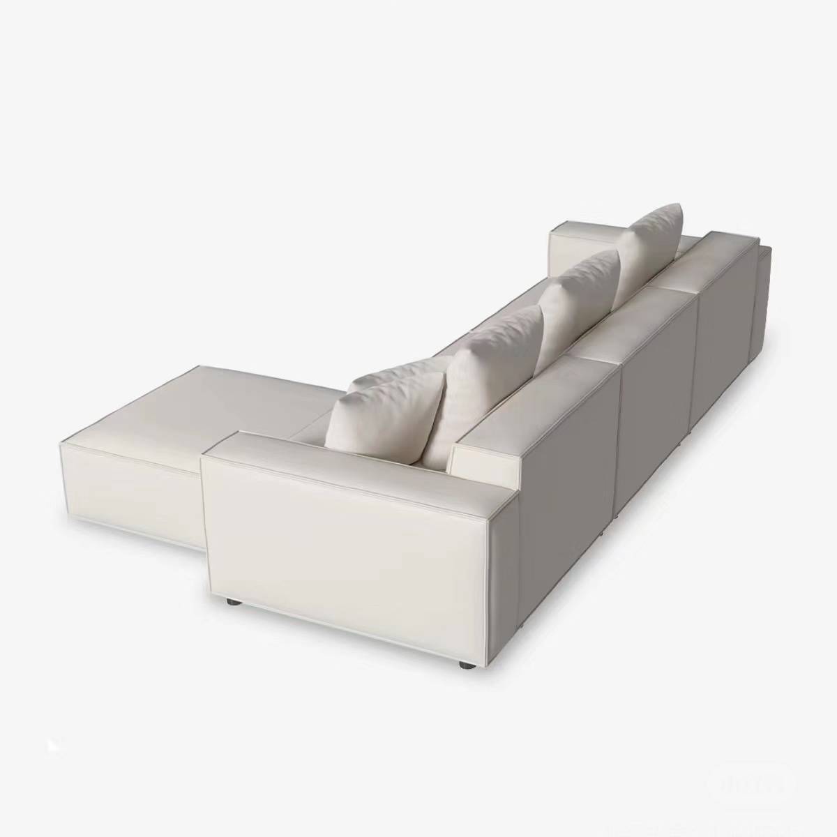 Corner view of the white modular sofa showing the chaise section