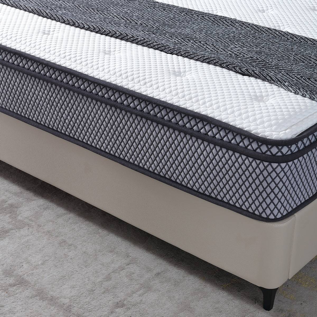 Side view of the bed frame showing the mattress and base structure