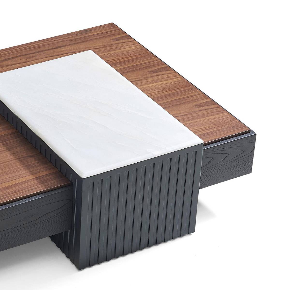 Close-up detail of the fluted black base and marble top of the coffee table