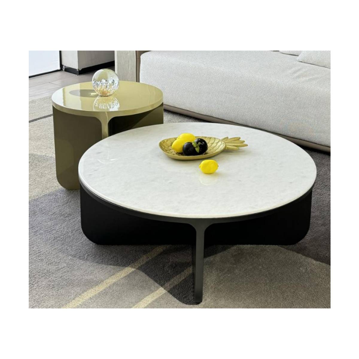 Lifestyle shot of the coffee table set in a living room setting with a sofa