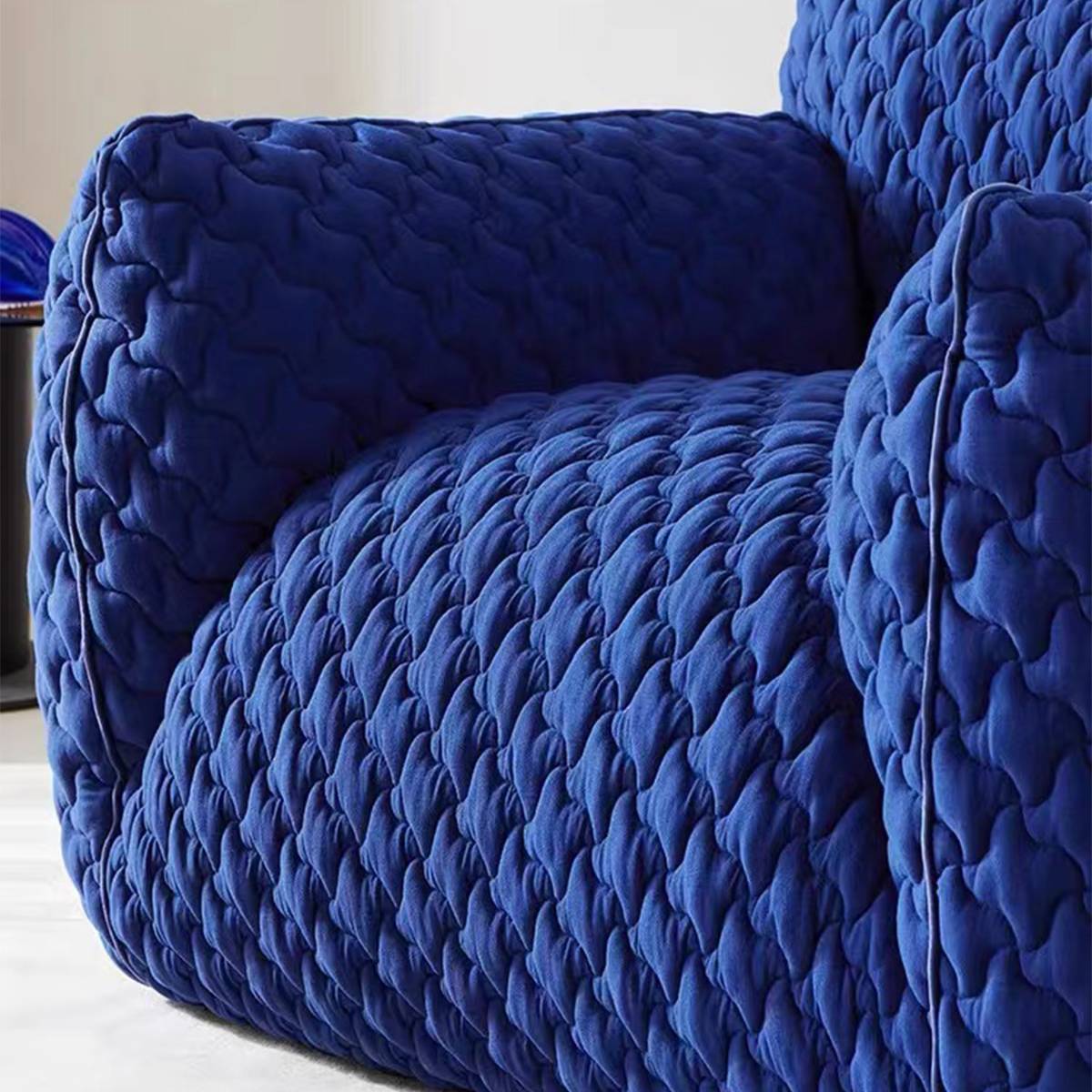 Close-up detail of the blue chenille fabric texture
