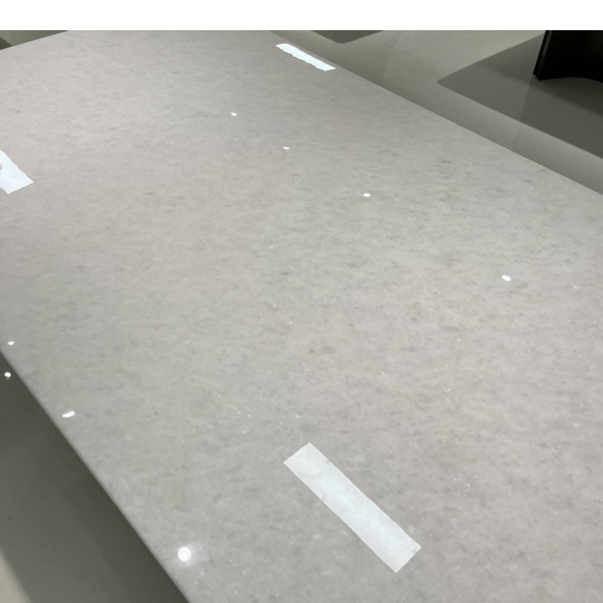 Close-up detail of the White Crystal marble tabletop surface