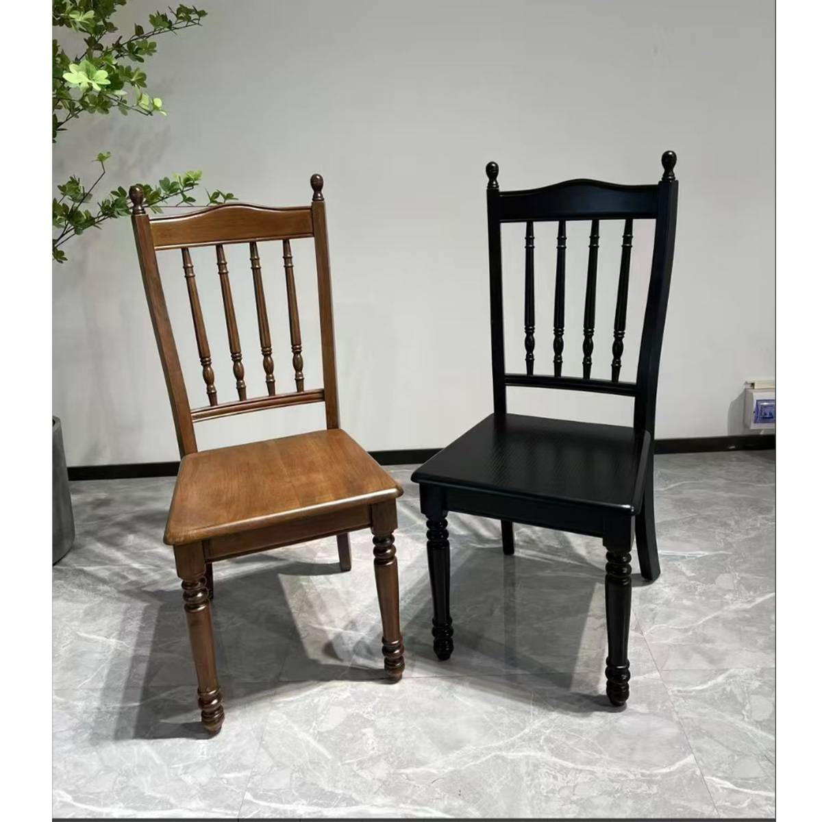 Comparison of walnut and black mid-century dining chairs