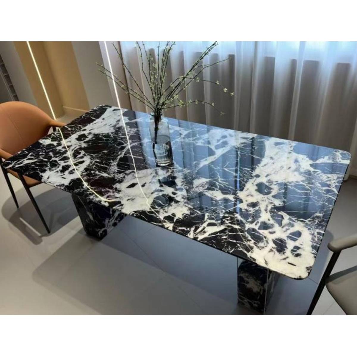 Top-down view of the black and white marble dining table