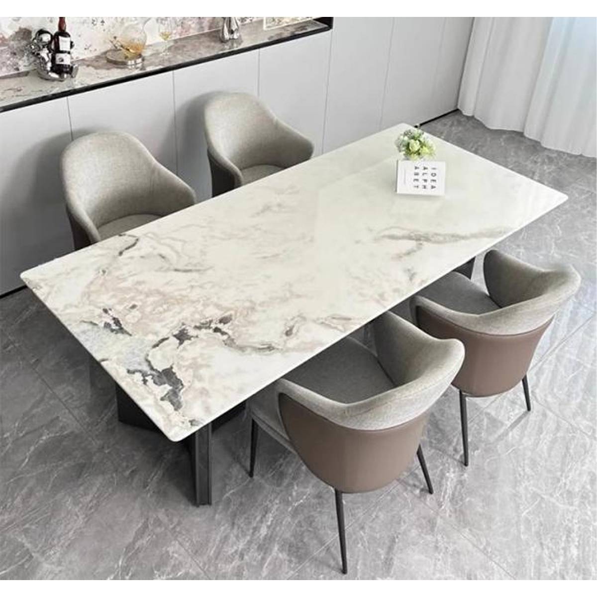 Top-down view of the dining table with chairs, displaying the full marble pattern