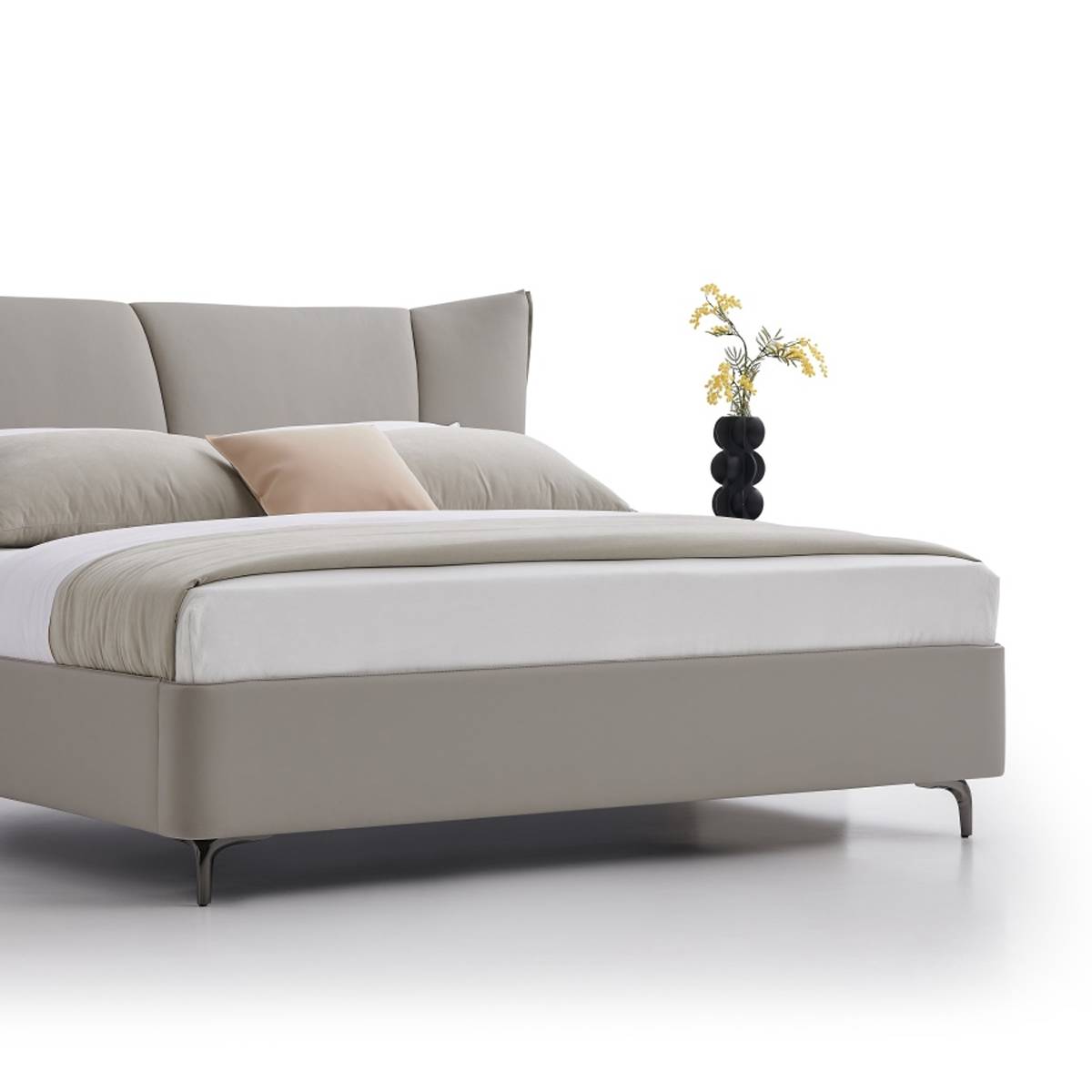Close-up view of the bed frame and metal legs