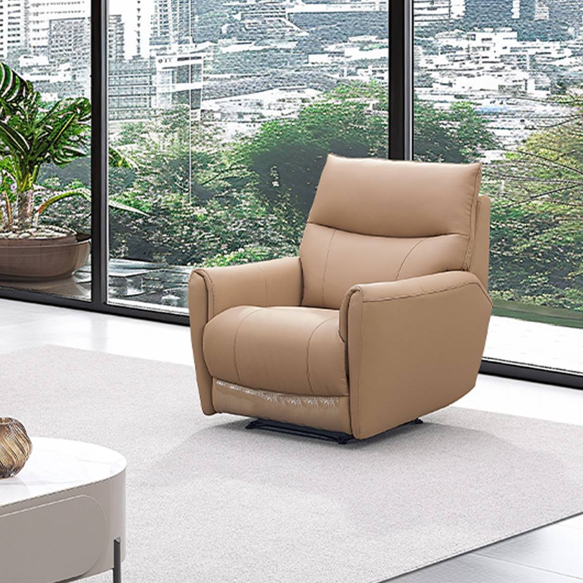 Close-up view of the matching beige leather recliner armchair.
